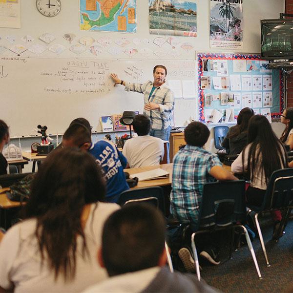 Teacher with students in the classroom